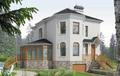 Проект дома из газоблоков 7х10 м с мансардой и эркером.